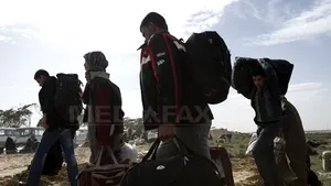Călătorie extenuantă pentru imigranţii evacuaţi din Libia, între care se află şi români