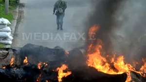 Patru vehicule OSCE, incendiate în regiunea separatistă ucraineană Doneţk