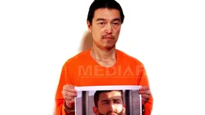 Japonia susţine că negocierile privind ostaticii SI sunt 