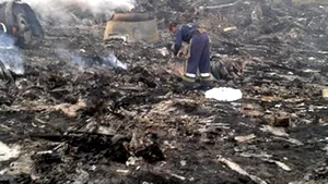 Primele FOTOGRAFII de la locul tragediei aviatice din estul Ucrainei, publicate de Russia Today pe Twitter - FOTO