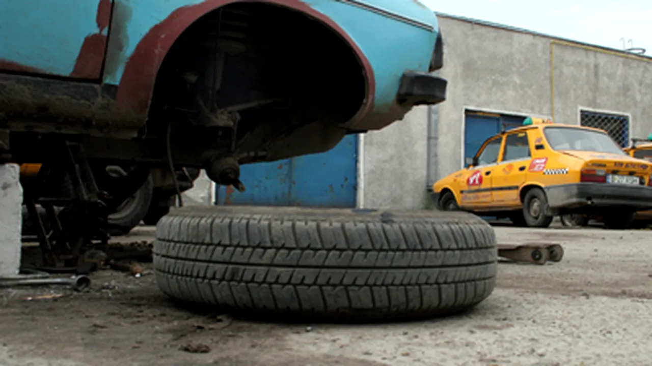 Circa o treime din service-urile auto ar putea da faliment în 2009