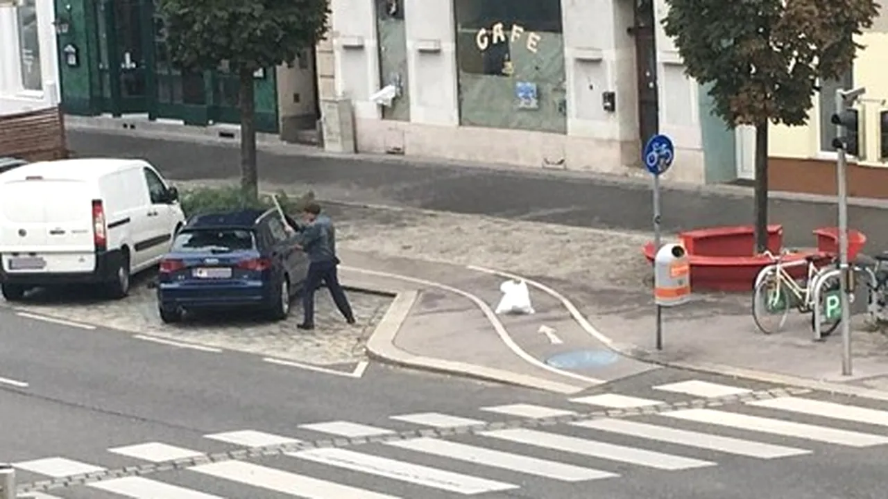 Un român care a vandalizat un autoturism şi a ameninţat poliţişti cu un cuţit a fost arestat în Viena | FOTO