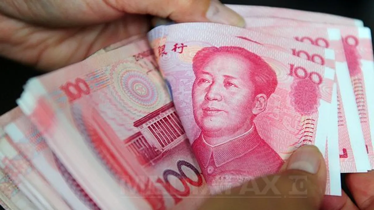 Moneda chineză se apreciază faţă de dolar. Va ajuta la stabilizarea economiei globale?