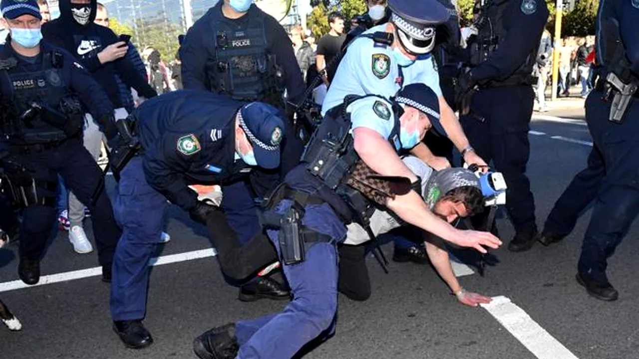 Cine sunt conspiraţioniştii germani din spatele protestelor anti-lockdown din Australia