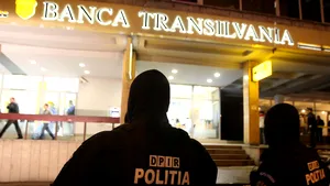 Cluj: Hârtii folosite la legarea banilor, găsite în apropierea băncii care a fost jefuită