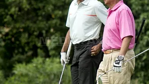 Premierul malaysian, criticat pentru că a jucat golf cu Barack Obama în loc să se ocupe de inundaţii - FOTO