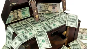 Cei mai bogaţi 1% dintre oameni vor depăşi jumătate din averea globală în 2016