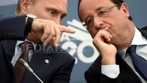 Putin s-a declarat pregătit să poarte discuţii cu Hollande în marja ceremoniilor din Franţa