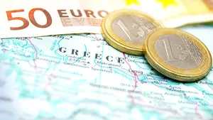 Zona euro a aprobat încă o tranşă pentru Grecia