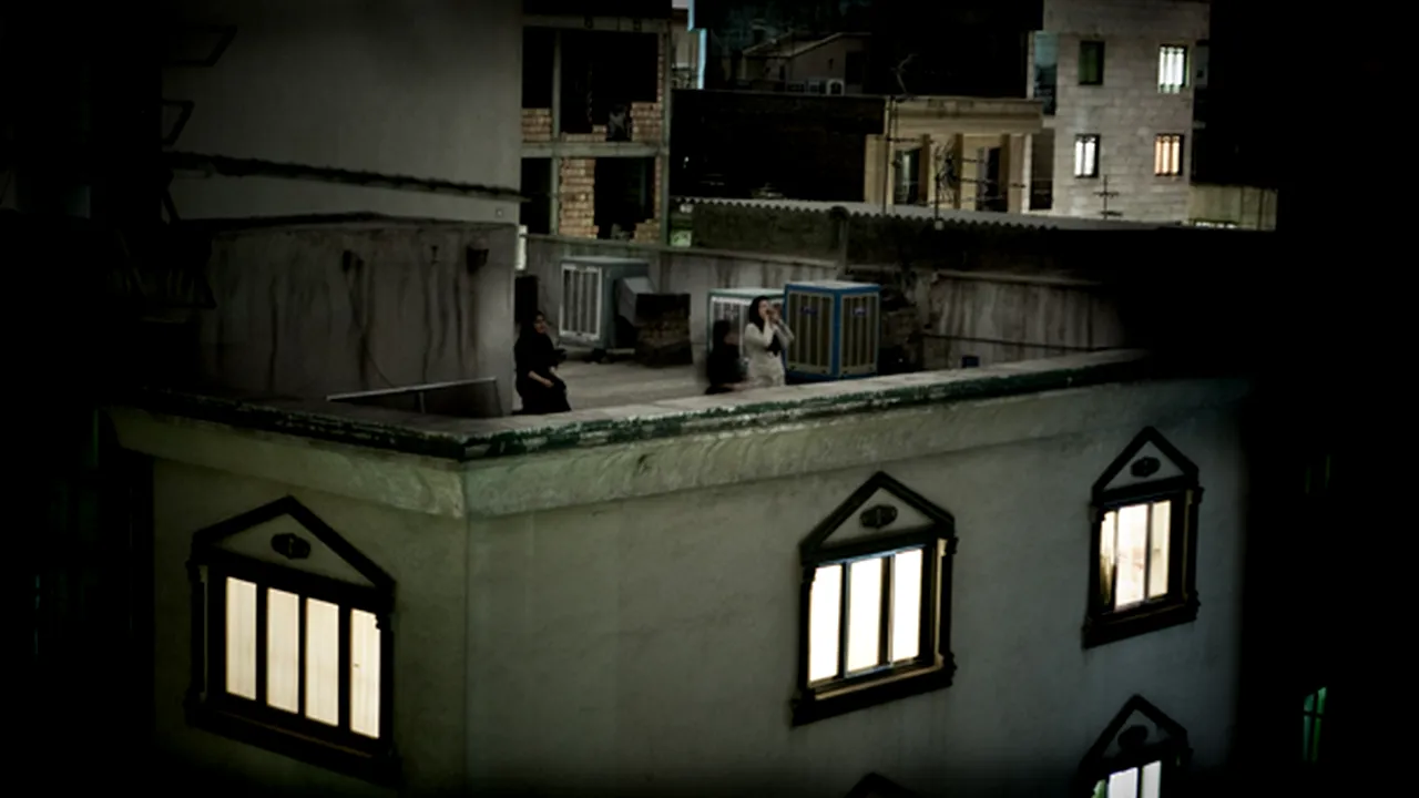 Fotografie câştigătoare la World Press Photo 2009, o imagine din timpul revoltelor din Iran
