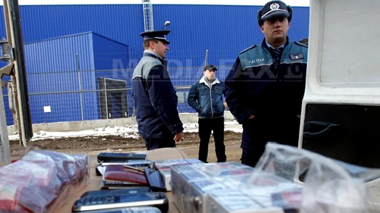 Percheziţii în Caraş-Severin, pentru destructurarea unei grupări de contrabandă cu ţigări 