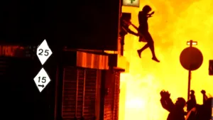 Un român ar fi salvat o tânără care a sărit dintr-o clădire incendiată de protestatarii britanici