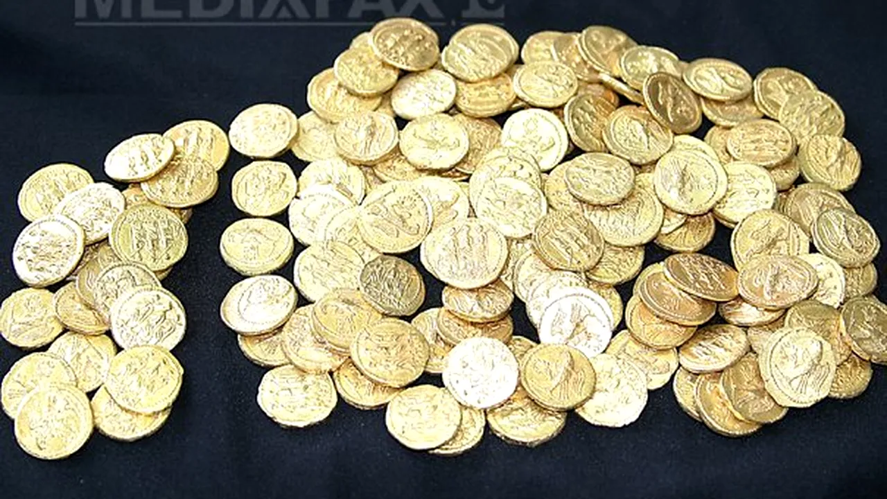 Hunedoara: 140 de monede dacice din aur, găsite de copii într-un recipient, într-o vizuină de vulpe