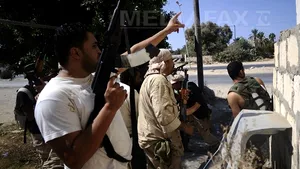 Confruntări violente la reşedinţa lui Kadhafi. Trei dintre fiii lui Muammar Kadhafi, arestaţi de rebeli - VIDEO