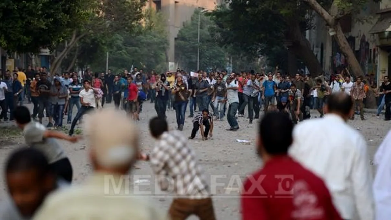 Cel puţin o sută de răniţi în urma confruntărilor dintre partizanii şi opozanţii lui Morsi la Cairo
