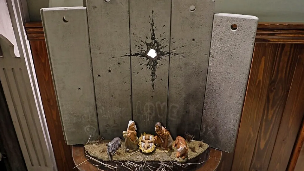 Controversatul Banksy a expus „Cicatricea din Betleem”, o variantă inedită a naşterii Mântuitorului. Cum arată - VIDEO
