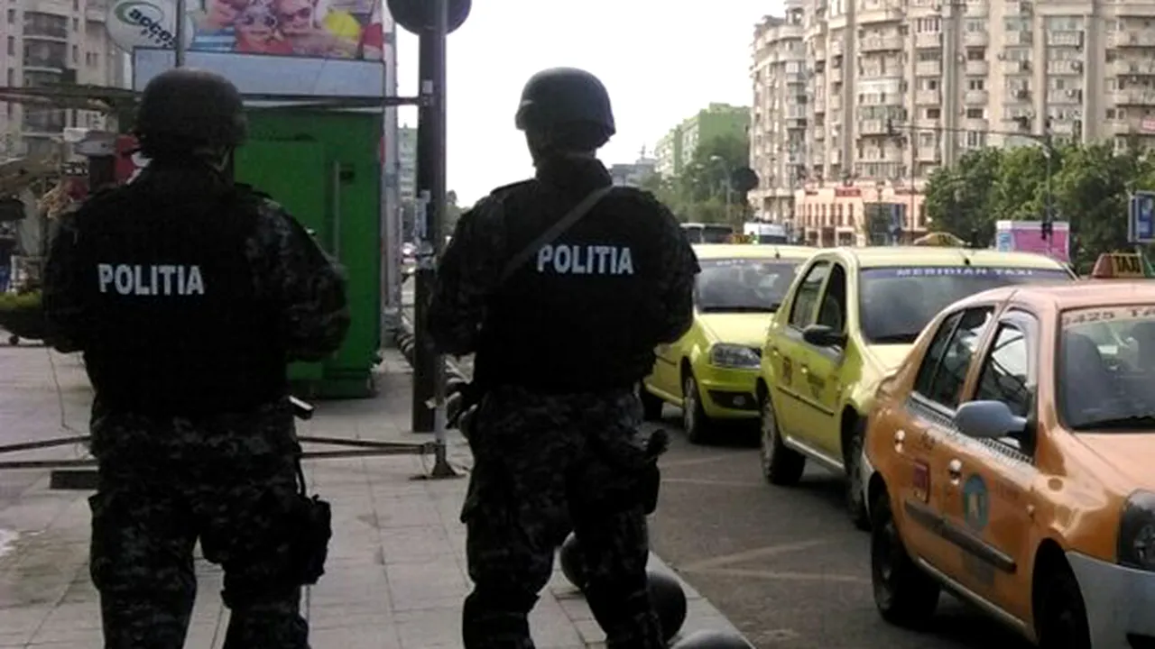 Incident violent în Capitală. Un bărbat a încercat să lovească cu toporul un luptător SAS şi a fost împuşcat în mână