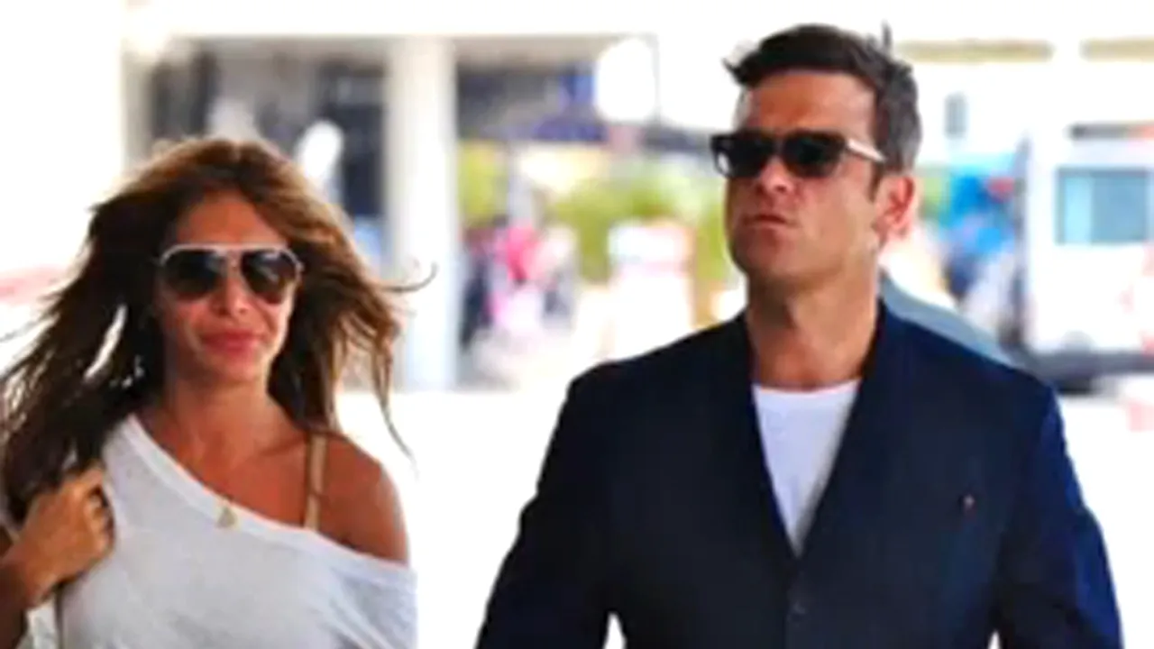 Robbie Williams pregăteşte un contract prenupţial pentru logodnica sa