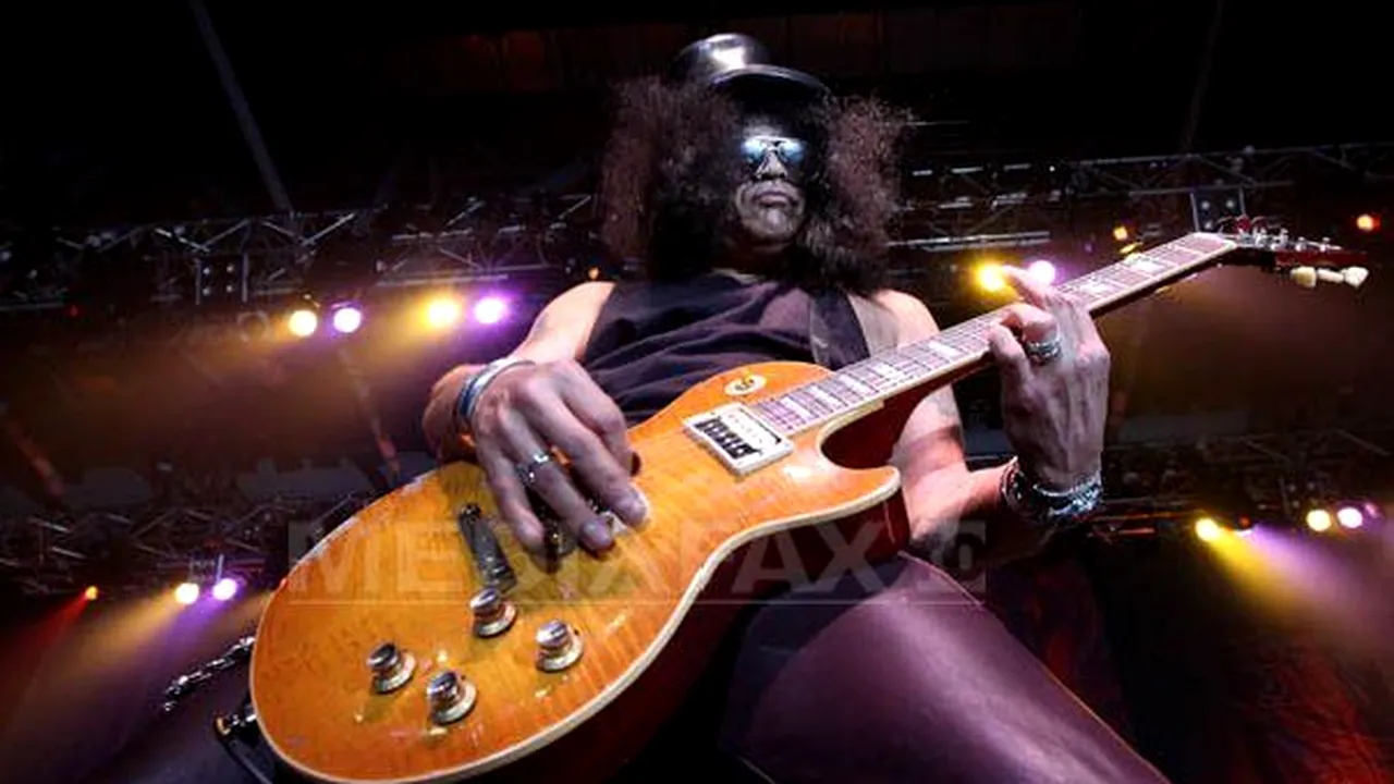 Război între Guns N' Roses şi Slash: Trupa le-a interzis fanilor să poarte tricouri cu fostul chitarist