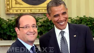 Hollande şi Obama îndeamnă la un 