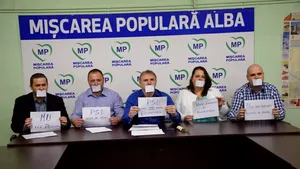 Lideri ai Mişcării Populare Alba au protestat faţă de Legea defăimării, apărând cu autocolante de hârtie lipite pe guri la o conferinţă de presă