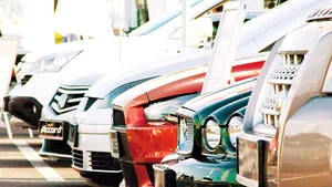 O divizie a Ţiriac Holdings ia vouchere şi pentru maşini second-hand