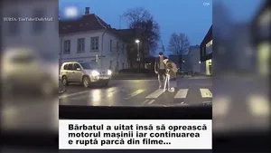 Un bărbat încearcă să ajute o bătrână să treacă strada, dar ce se întâmplă după ce se dă jos din maşină întrece orice imaginaţie 