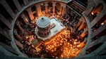 Sfânta Lumină s-a pogorât la Biserica Sfântului Mormânt din Ierusalim. Când va ajunge în România