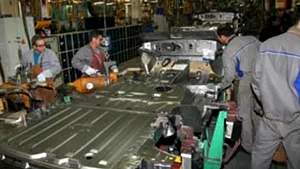 Opel intenţionează să disponibilizeze 11.000 de salariaţi
