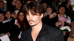 Johnny Depp, dat în judecată de două foste gărzi de corp