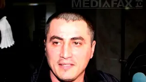 Cristian Cioacă, adus încătuşat la Curtea de Apel Braşov pentru dosarul de infracţiuni informatice