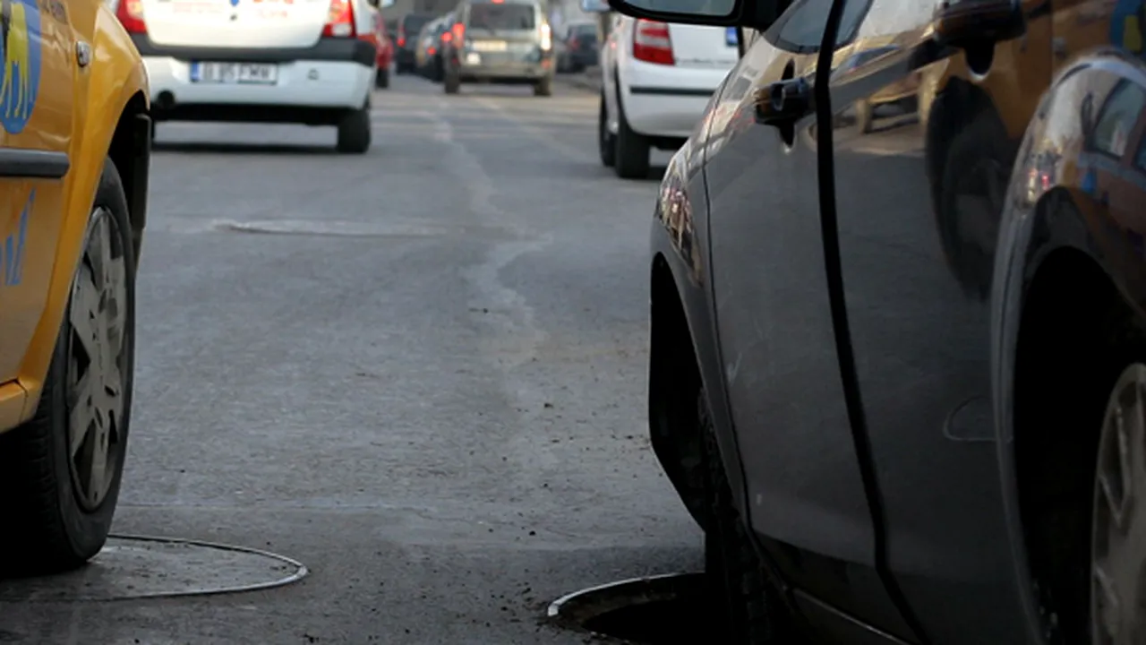 A vrut să-şi plătească taxa auto, dar a rămas cu maşina blocată într-o groapă din faţa DGFP