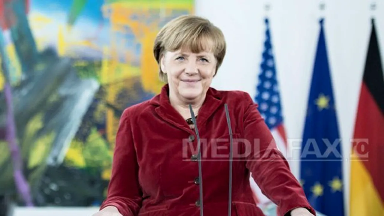 Angela Merkel îl felicită şi îl susţine pe premierul ucrainean Arseni Iaţeniuk
