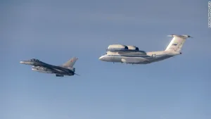 Forţele aeriene belgiene au difuzat imagini care surprind escortarea unor avioane militare ruse - FOTO