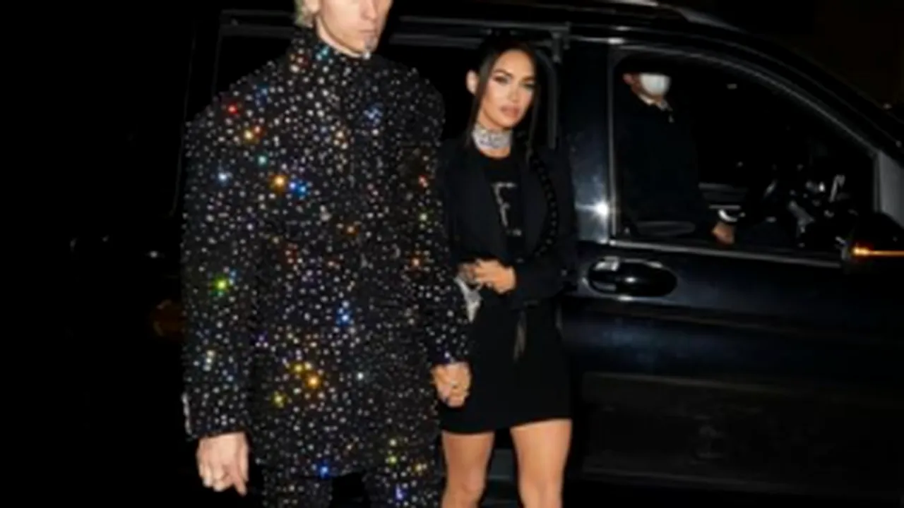 Machine Gun Kelly şi Megan Fox uimesc în prima apariţie pe covorul roşu după ce s-au logodit