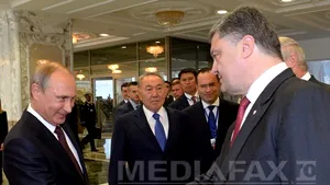 Vladimir Putin a dat mâna cu Petro Poroşenko, la summitul de la Minsk