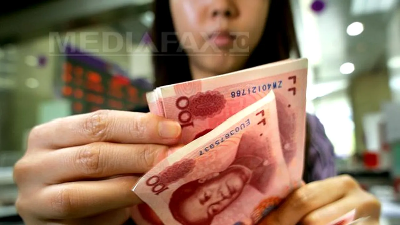 Economia Chinei a crescut în trimestrul patru al anului trecut cu 7,7%, încetinind uşor