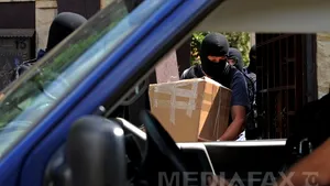 Percheziţii în Dâmboviţa, la persoane suspectate de fraudarea mai multor bancomate