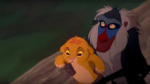 Un babuin şi un pui de leu au recreat în realitate o scenă celebră din „Lion King” | FOTO