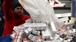 Țigări de peste o jumătate de milion de euro, ascunse într-un camion cu materiale de construcții
