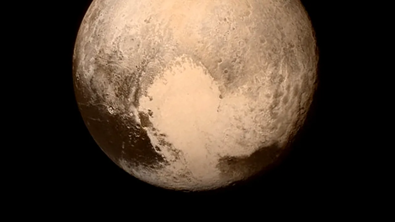 NASA publică o nouă imagine impresionantă cu planeta Pluto - FOTO