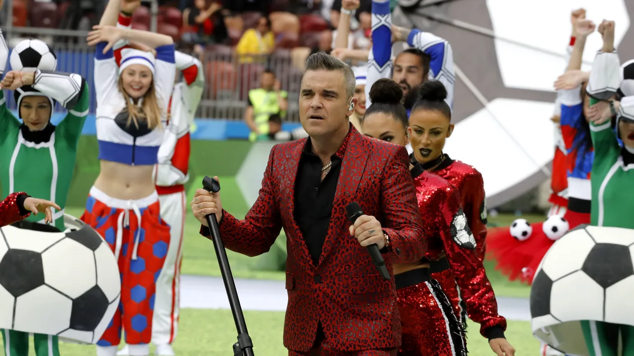 Fox îşi cere scuze pentru gestul obscen făcut de Robbie Williams în deschiderea CM 2018