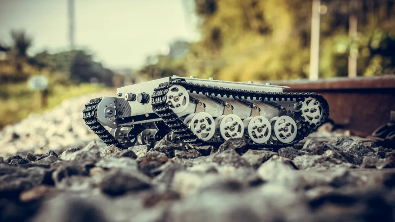 Ajutor neașteptat. O femeie cu batic în cap a ajutat un robot militar să-și îndeplinească misiunea