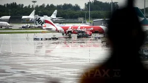 O familie indoneziană de 10 persoane a ratat avionul AirAsia dispărut pentru că a întârziat la aeroport