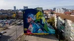 Mural de 400 de metri pătrați cu David Popovici pe o clădire din Timișoara