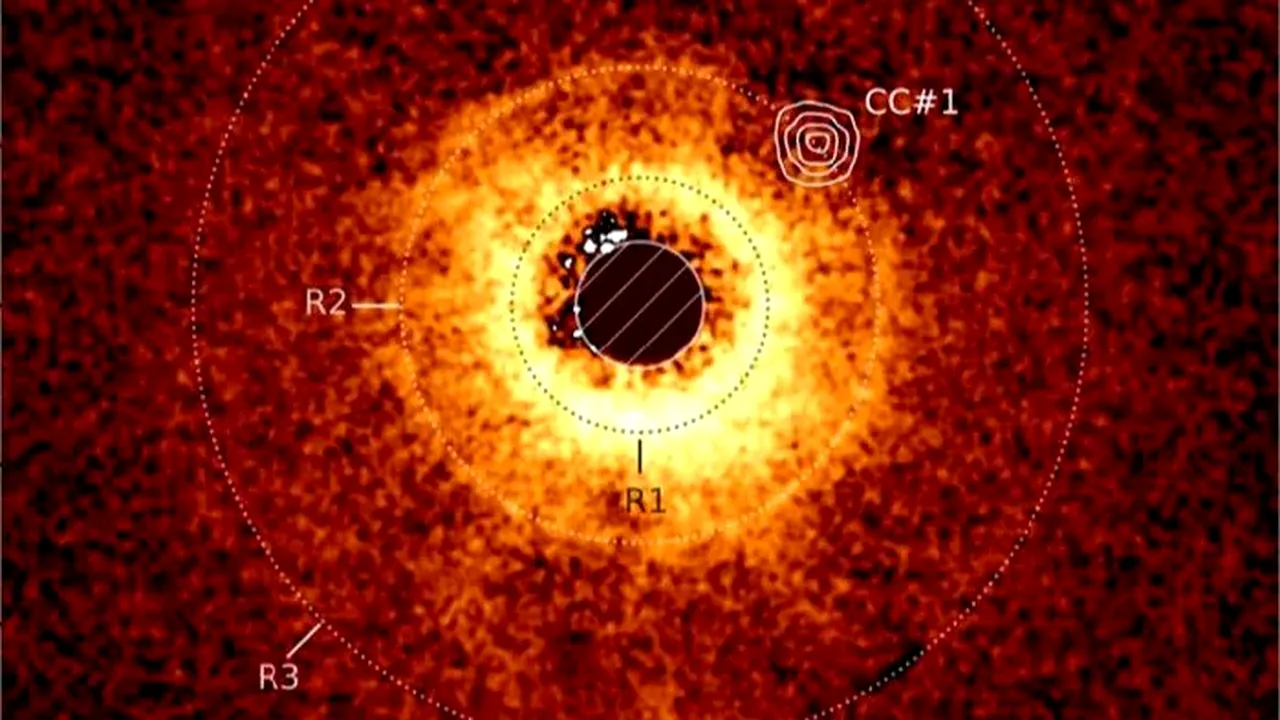 Telescopul James Webb a descoperit o planetă de dimensiunea lui Saturn care modelează un disc stelar