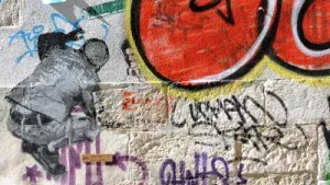 Graffiti Artists Paint Bucharest Police Fence In Violence Prevention Campaign