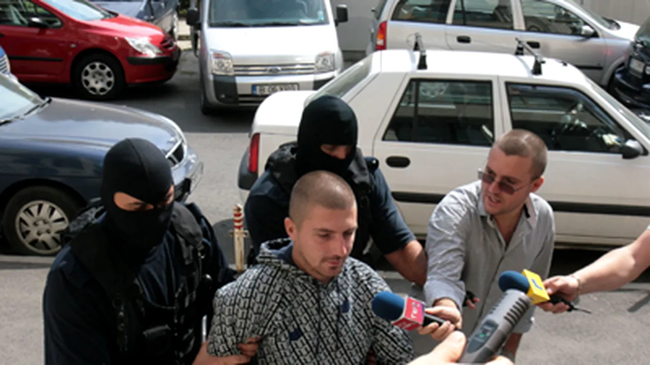 Iustin Covei şi alte 13 persoane, reţinute în dosarul falsificatorilor de carduri