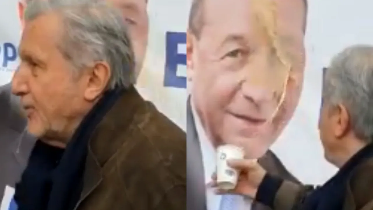 Ilie Năstase, filmat în timp ce aruncă un pahar de cafea pe afişul lui Traian Băsescu: „Eşti nebun, Iliuţă. Te filmez!”- VIDEO