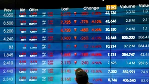 Piețele asiatice scad, în timp ce traderii se pregătesc pentru datele cheie din SUA